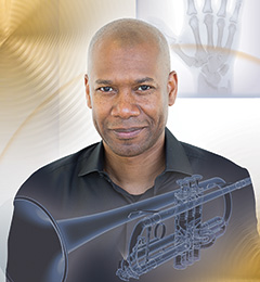 James Ford, ('97 M.M., '07 D.M.A.) professor of music at California State University in Los Angeles, researches performance-related injuries. (Photo by Renee Vernon)
