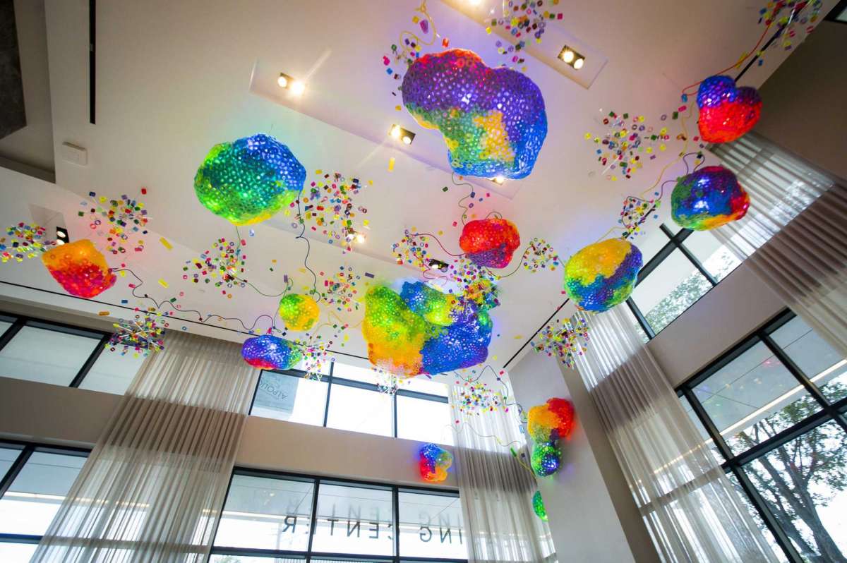 Adela Andea's "The Great Barrier Reef" hangs from the lobby ceiling at the new Drewery Place luxury high-rise in midtown Houston, Tuesday, July 2, 2019.
